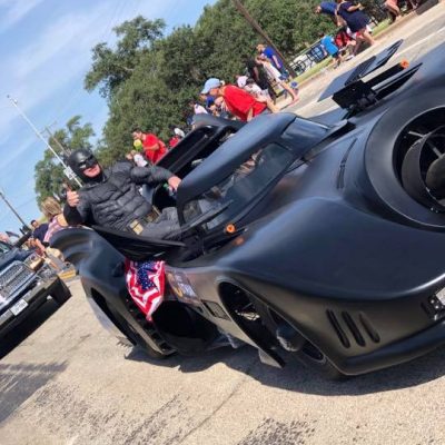 Lubbock batman and the batmobile in a local lubbock parade