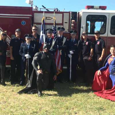 Lubbock batman and Superman with Lubbock first responders