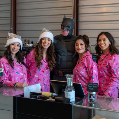 Lubbock Batman at A Plus Super Storage for Santa's Pajama Party!